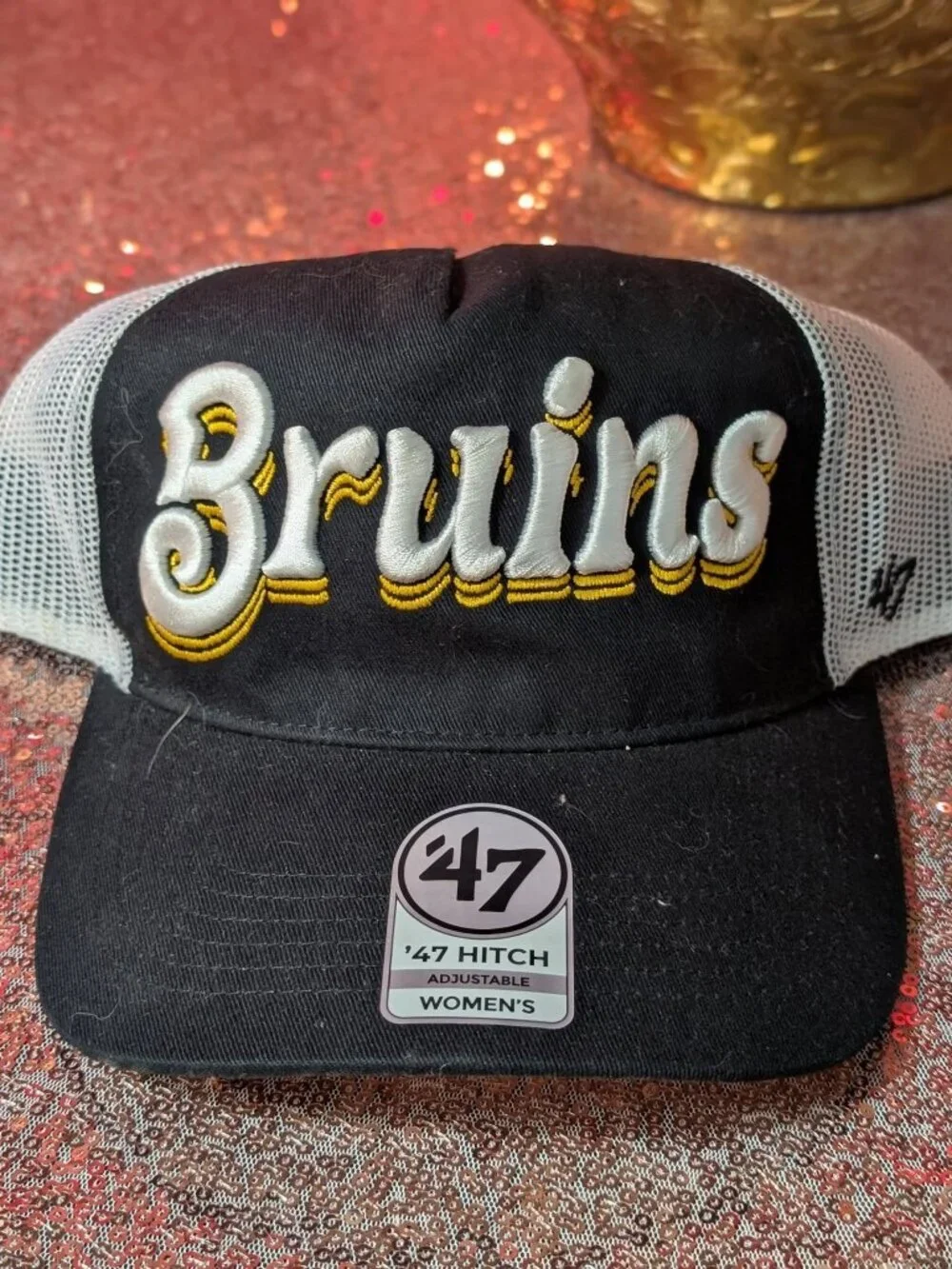 This '47 Brand Boston Bruins Hitch trucker hat features white mesh back panels
